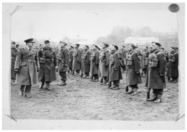 Gov Gen Sir Cyril Newall inspecting D coy 28 Maori Bat