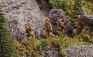 Chinese troops traverse a mountain