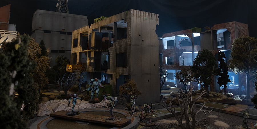 Night time ruins and dark woods with post apocalyptic atmosphere and sci-fi miniatures.